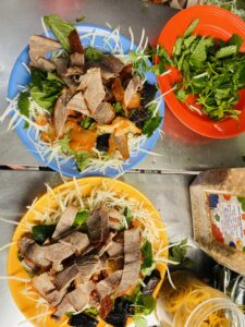 A shared table of Hanoi street food dishes