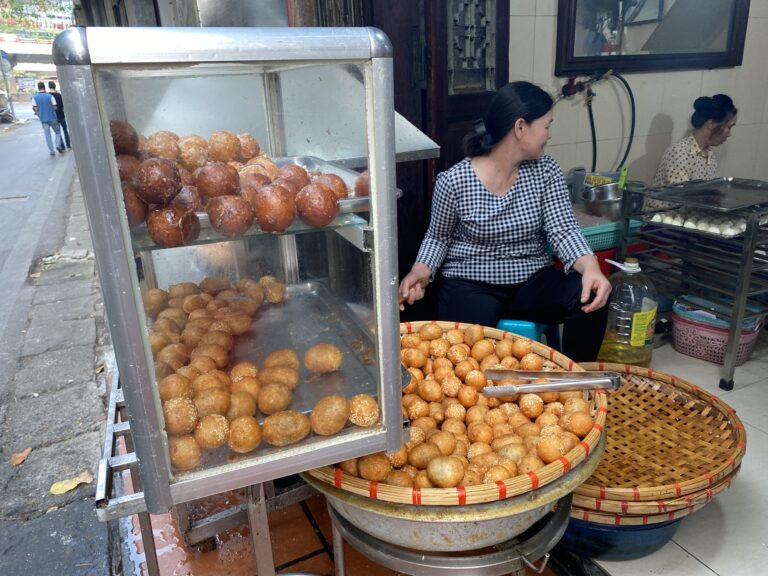 Bánh rán displayed at a Hanoi street food stall